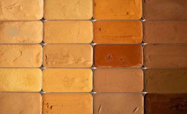 terracotta tile floor installation, earth tone tile bathroom ideas