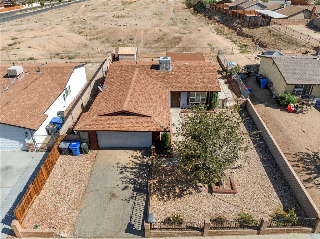2013 Rushmore Drive, Barstow – 3 bed, 1.5 bath single-story home, 962 sq ft, ~0.15 acre lot, tenant occupied, attached 2-car garage