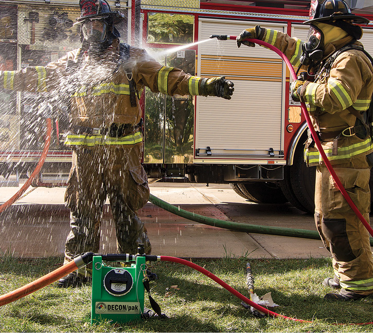 Firefighters decontaminating