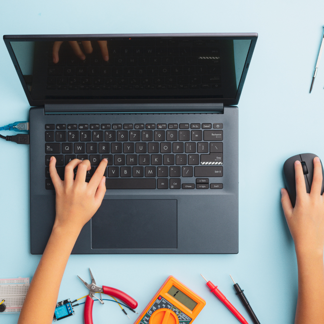 child hands typing on an assistive technology device child hands typing on an assistive technology device