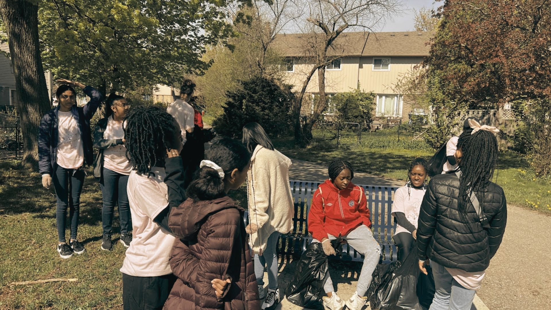 A group of kids in the park A group of kids in the park