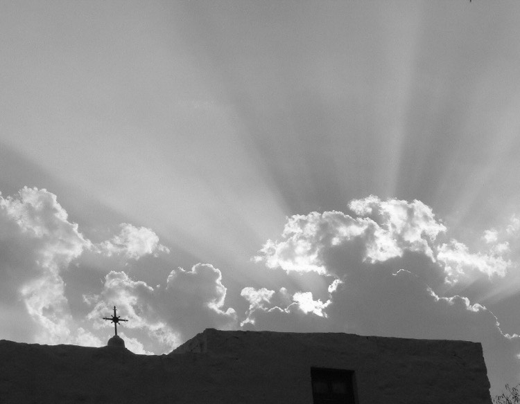 Glimpses of heaven over St. John's grotto in Patmos, Greece Glimpses of heaven over St. John's grotto in Patmos, Greece