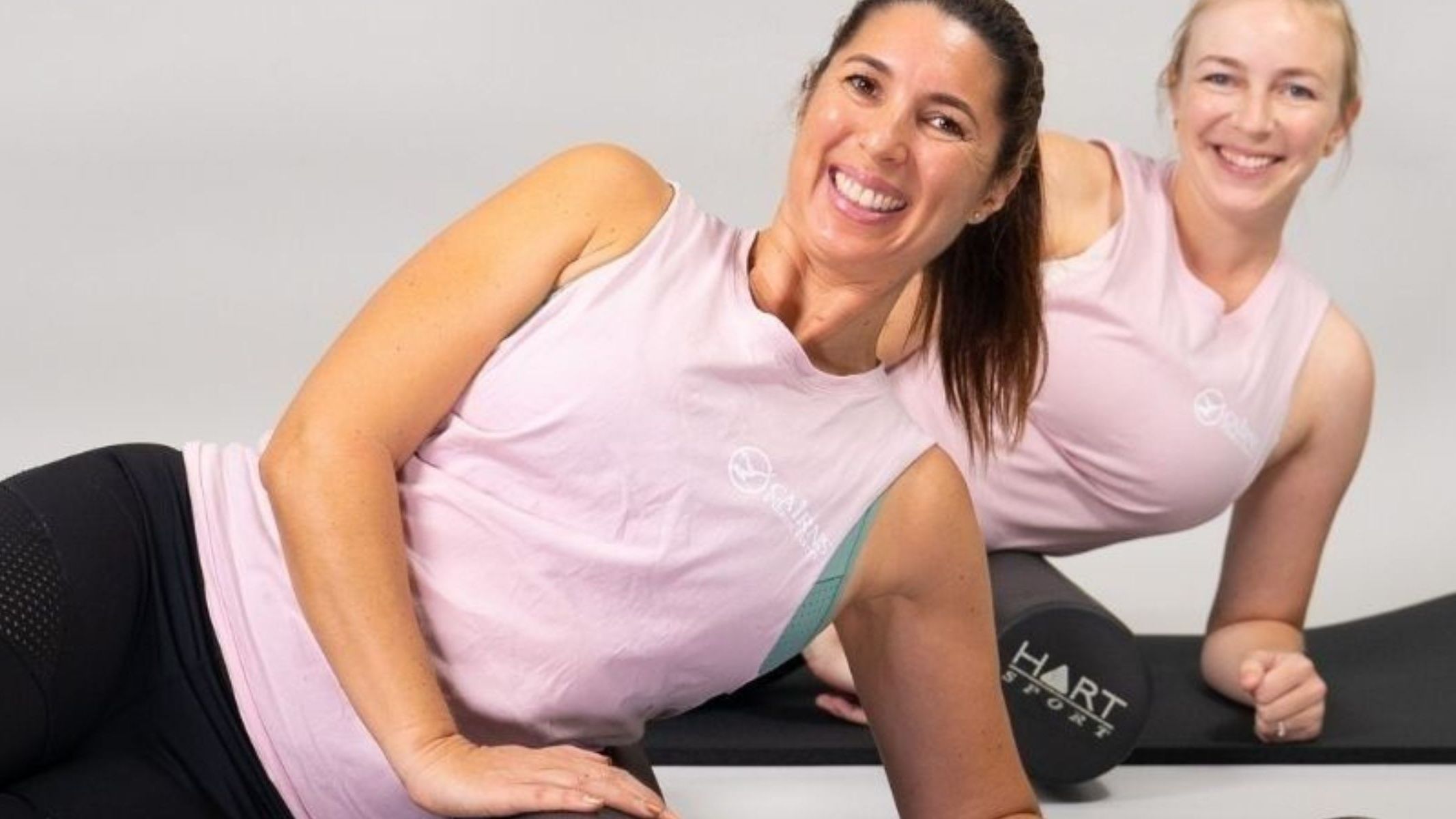 Women having fun doing Pilates