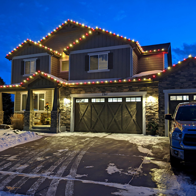 Warm white and red Christmas light combination Colorado home