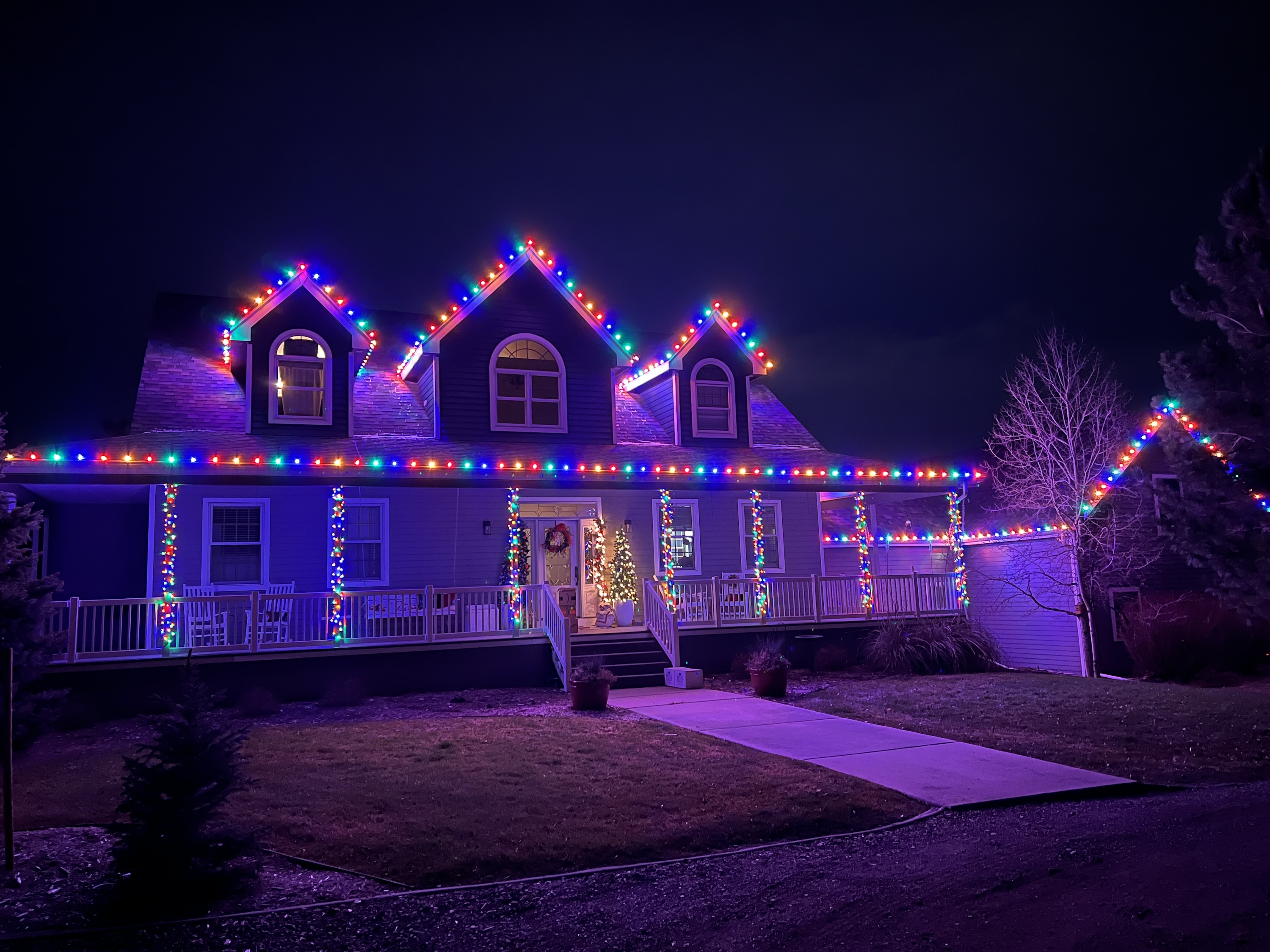 Vibrant multi-color Christmas light installation Greeley Colorado