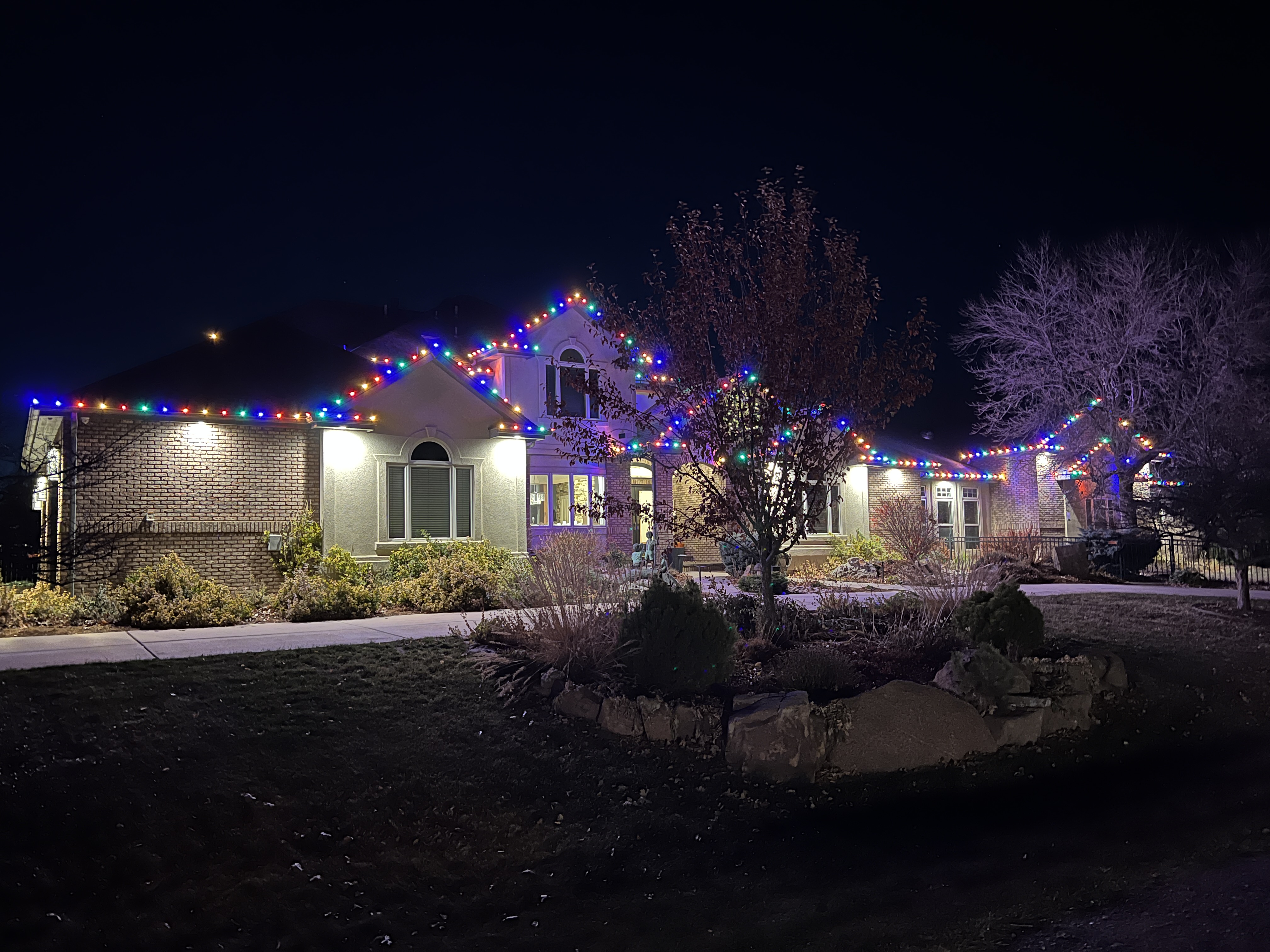 Multi-color Christmas light display with professional installation