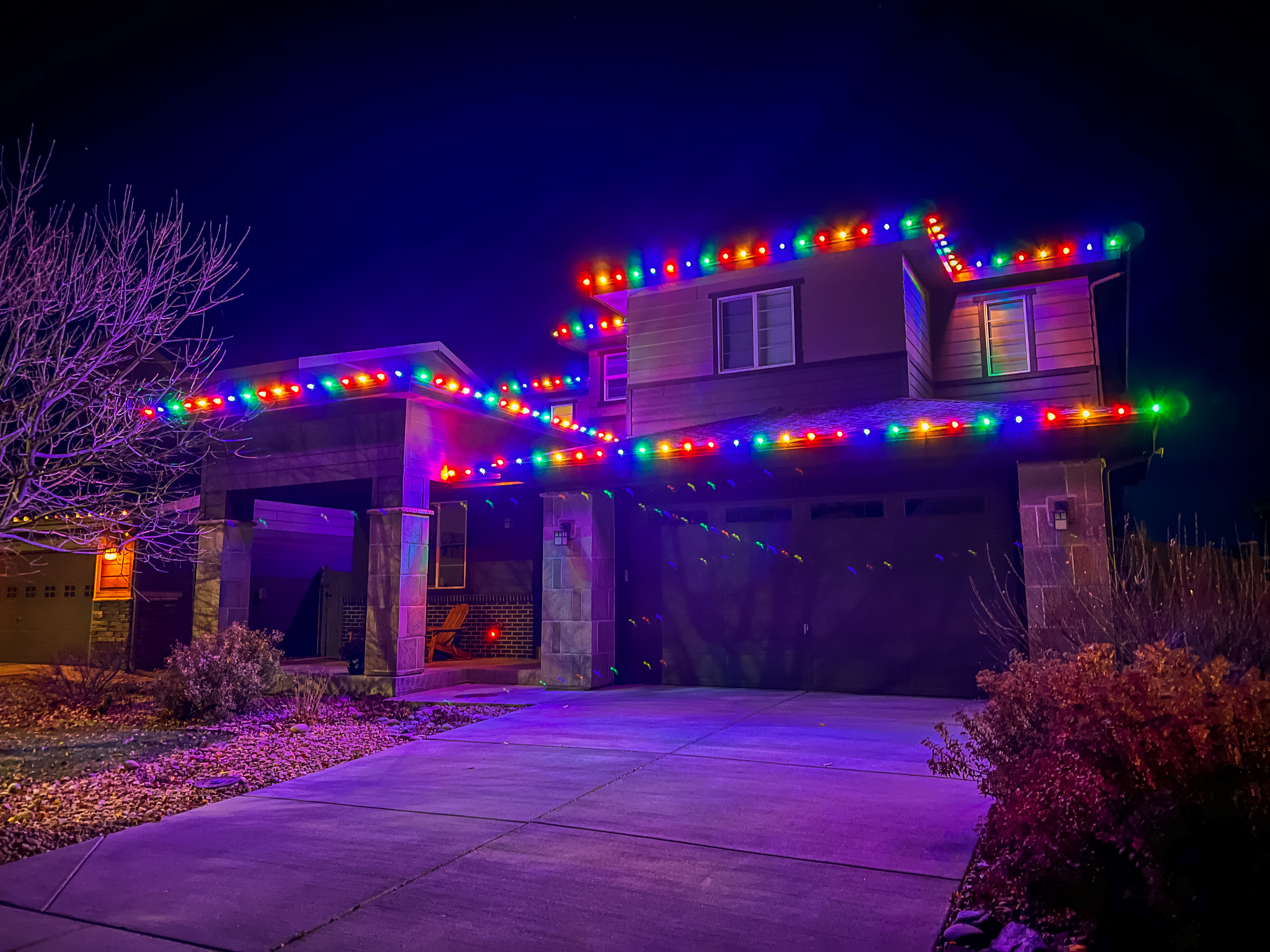 Festive multi-color holiday light installation Greeley area