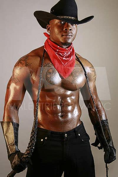 Black male stripper Incredible, extremely muscular, cowboy, bullwhip, bandana, and cowboy hat