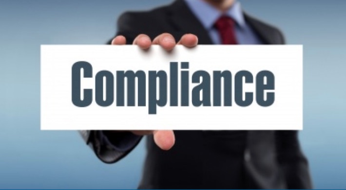 Material compliance in bold text