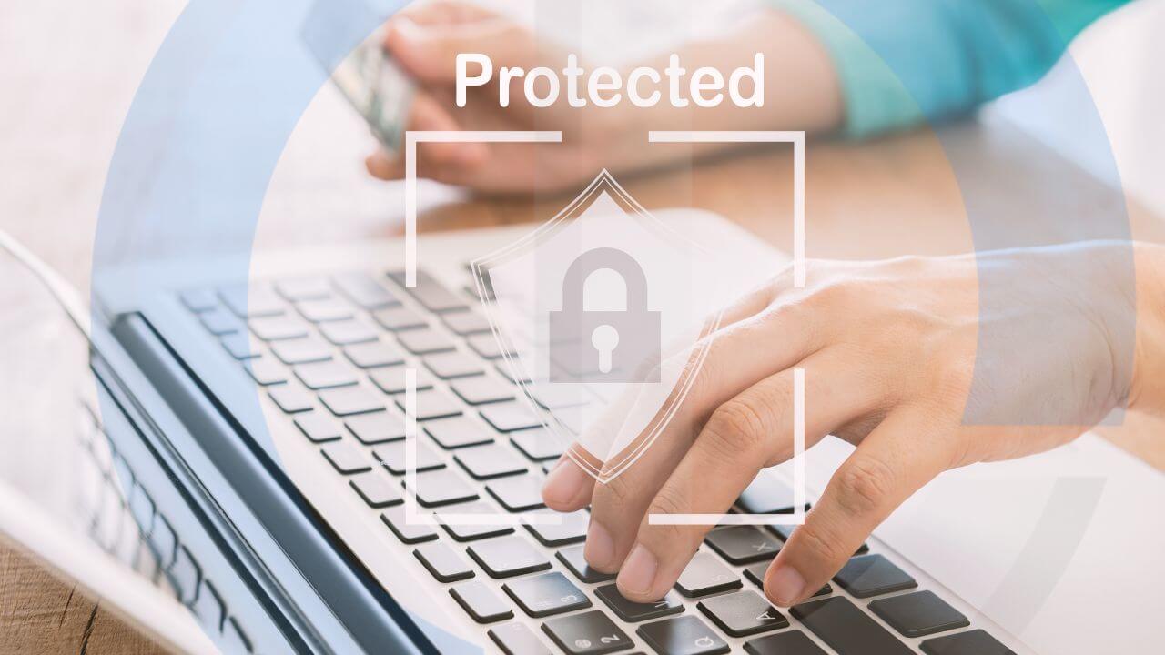 Person using laptop with “Protected” lock icon overlay, symbolizing cybersecurity against RaaS threats. Person using laptop with “Protected” lock icon overlay, symbolizing cybersecurity against RaaS threats.
