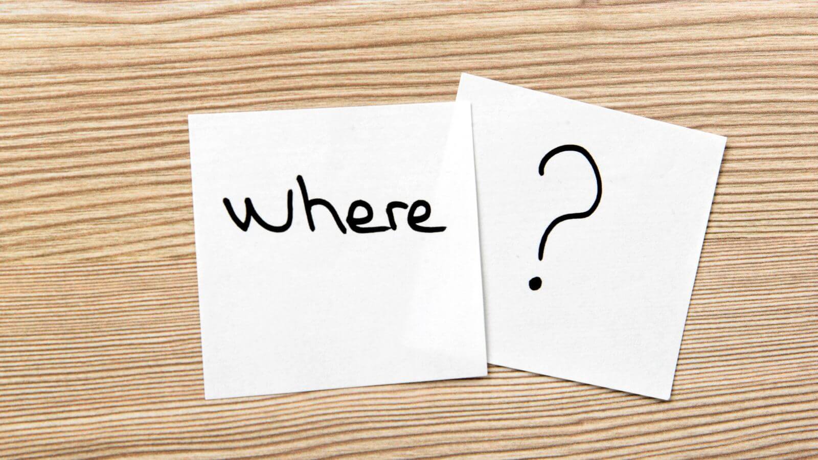 Sticky notes on wood reading 'where' and a question mark, symbolizing challenges. Sticky notes on wood reading 'where' and a question mark, symbolizing challenges.