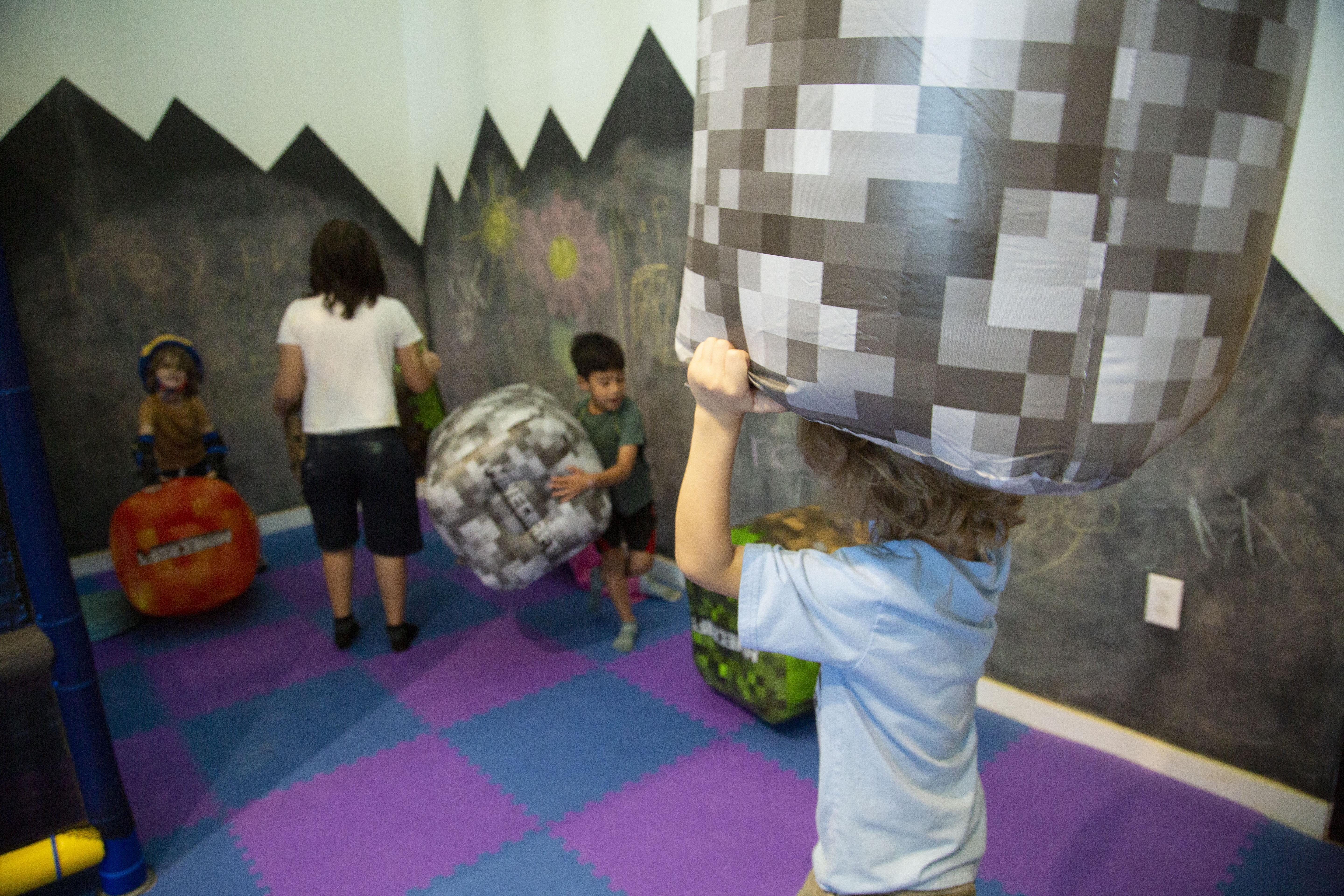 kids playing with Minecraft bock at a kids birthday party kids playing with Minecraft bock at a kids birthday party