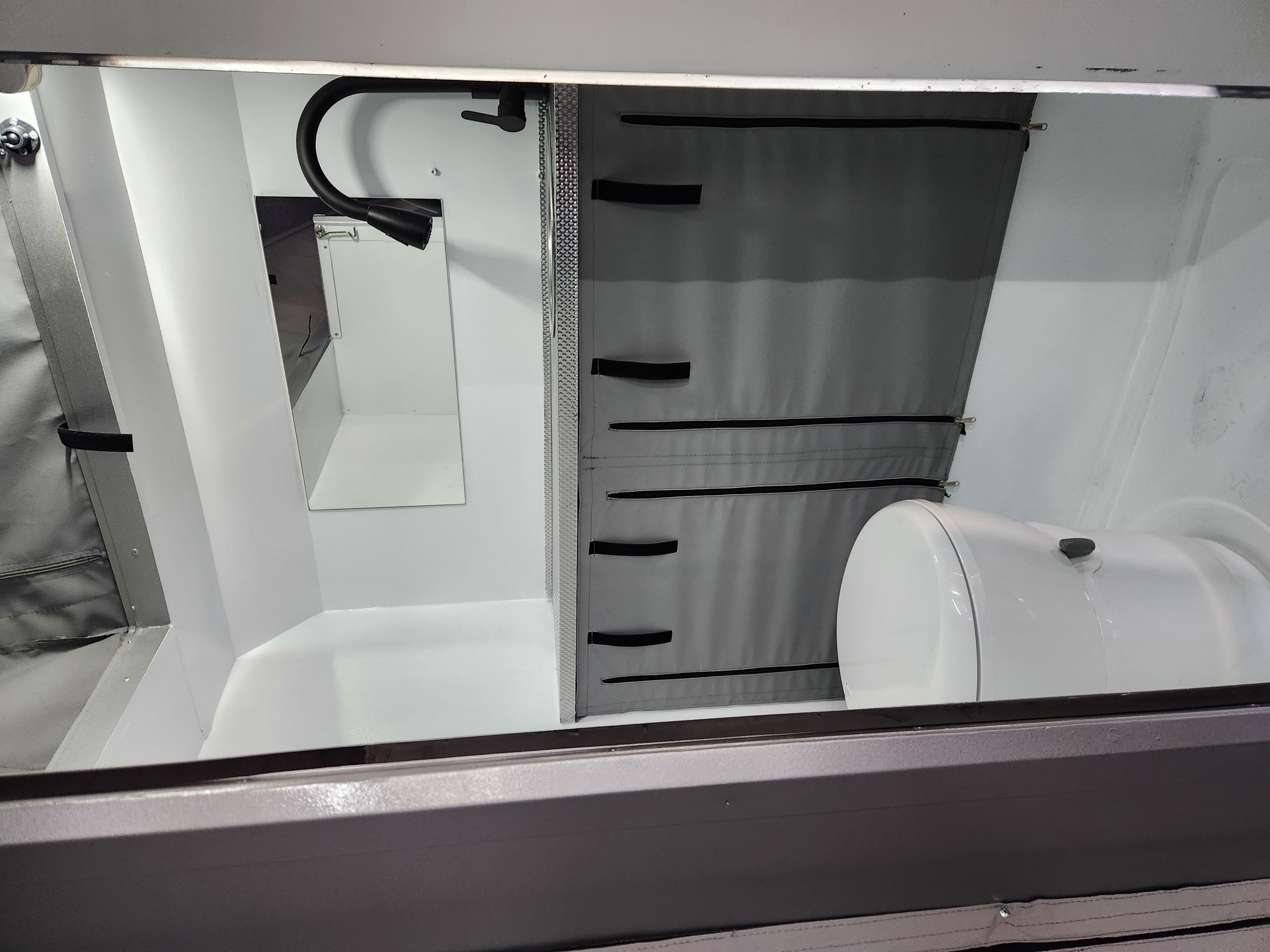 AdventurePod XL interior bathroom with shower setup