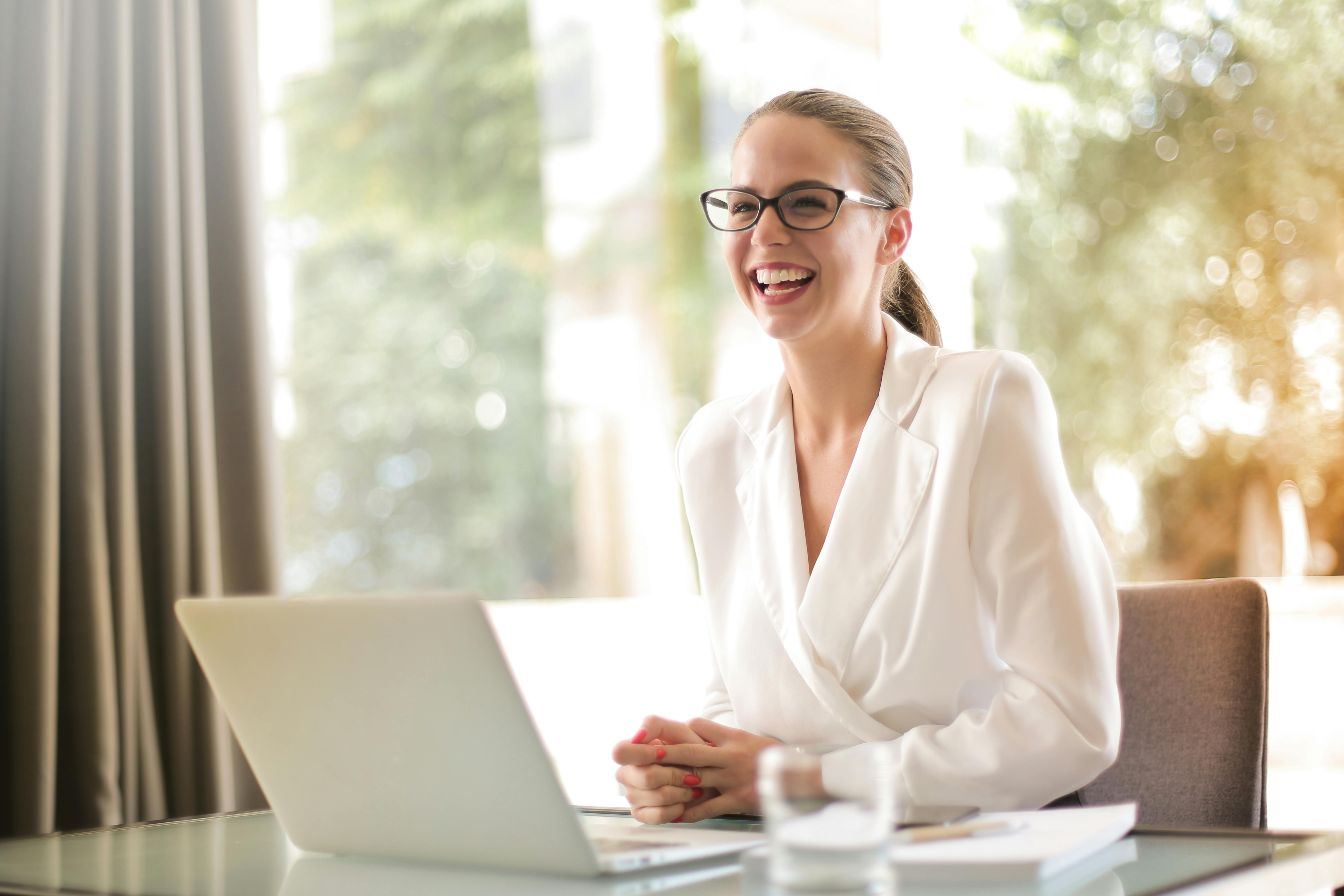 happy smiling businesswoman at desk laptop happy smiling businesswoman at desk laptop