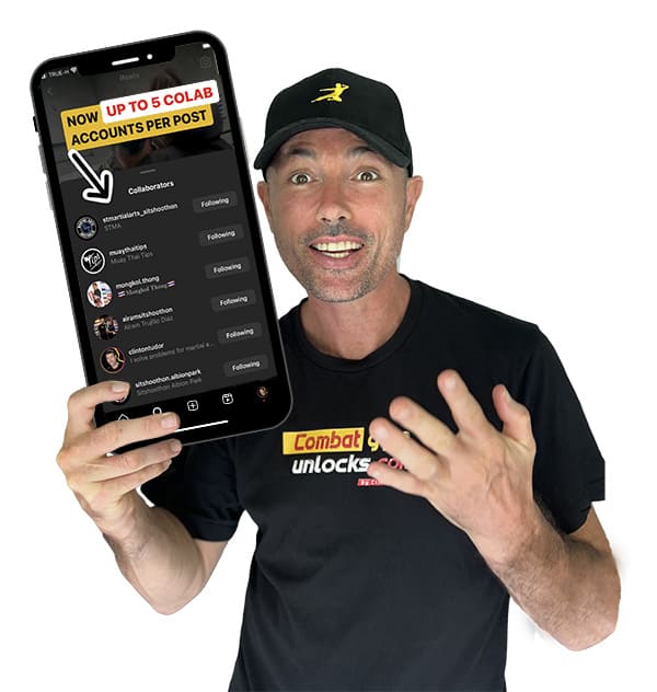 Clinton Tudor holding giant phone happy about colab feature on instagram