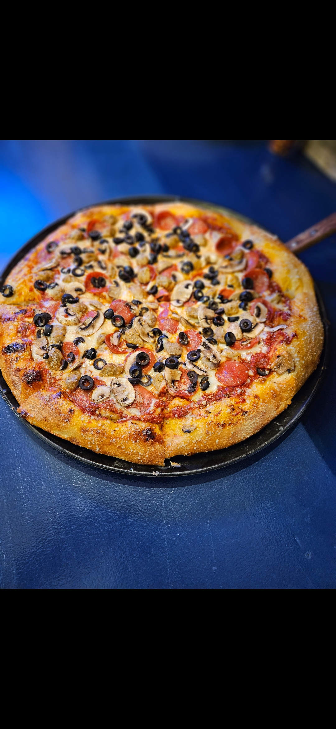 A Lisa's Tavern Specialty Pizza