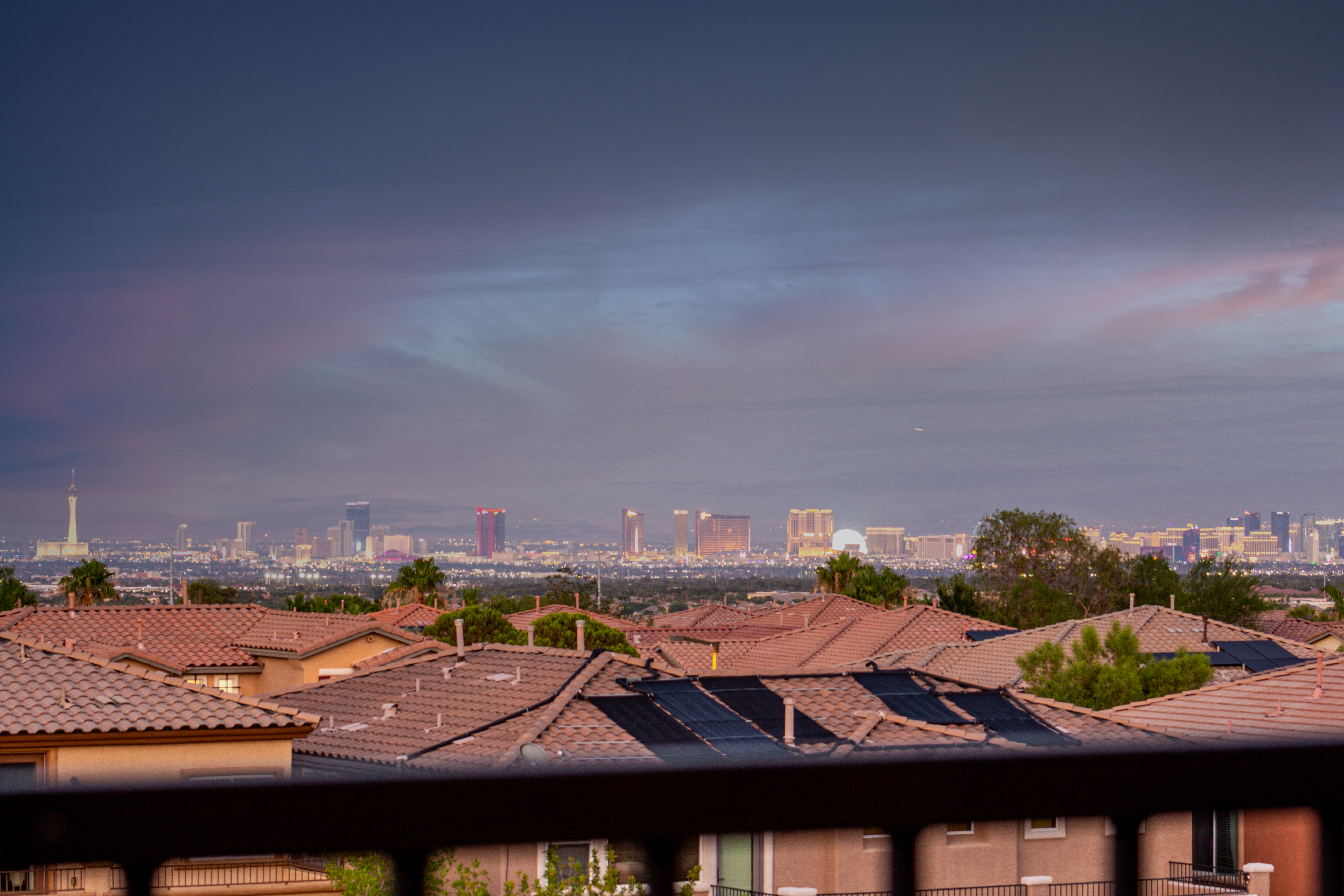 Panoramic Las Vegas Strip view at dusk from a private balcony in Summerlin’s gated Mariposa community — showcasing luxury living and stunning skyline views. Panoramic Las Vegas Strip view at dusk from a private balcony in Summerlin’s gated Mariposa community — showcasing luxury living and stunning skyline views.