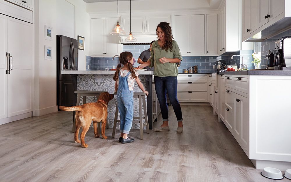 Newly installed flooring being admired by home owners