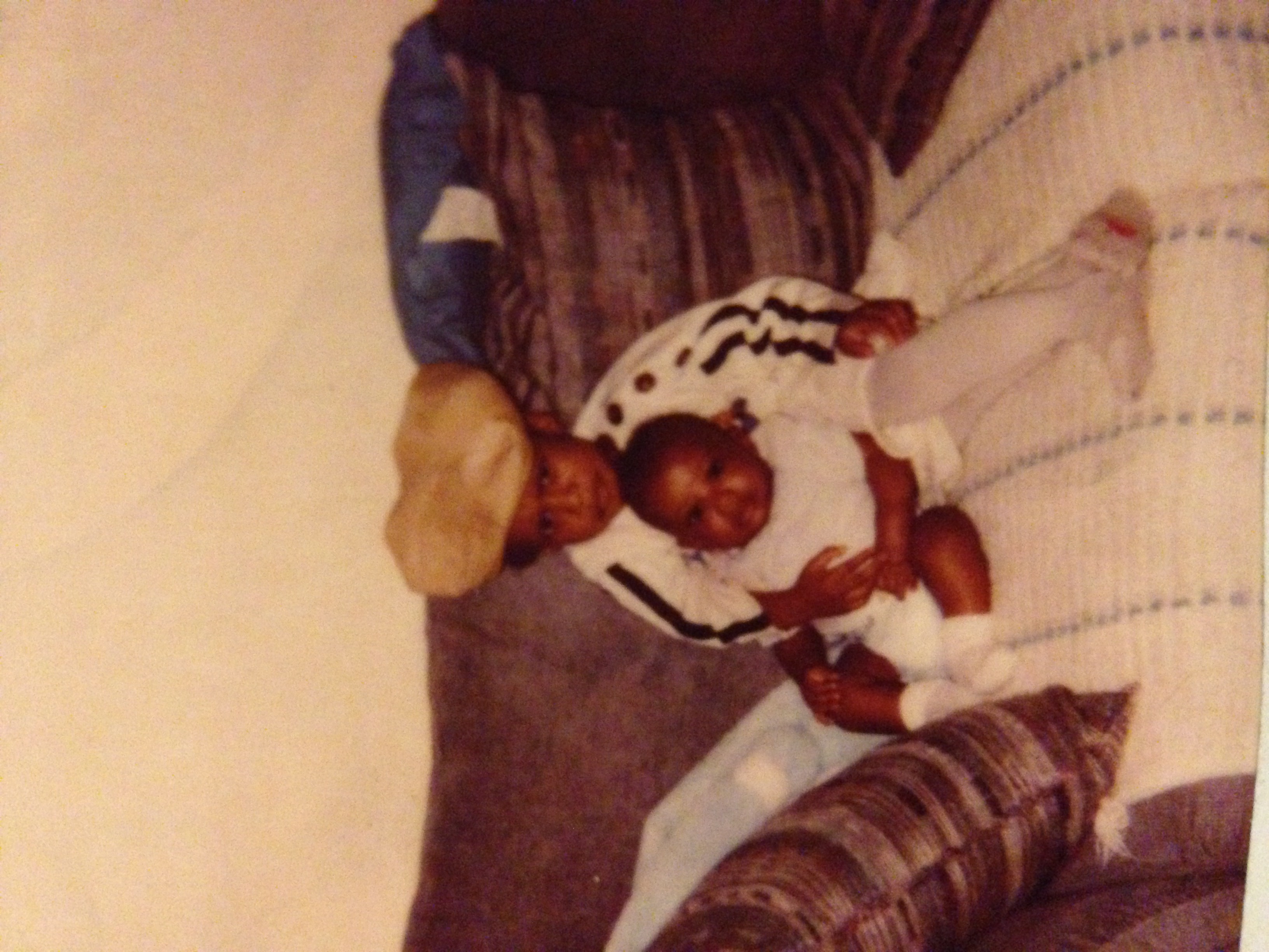 Younger Sharronda Smith with baby brother. Younger Sharronda Smith with baby brother.