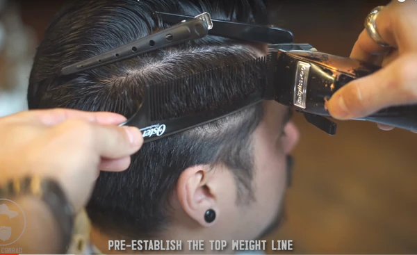 fixing a fade line with a clipper-over-comb technique