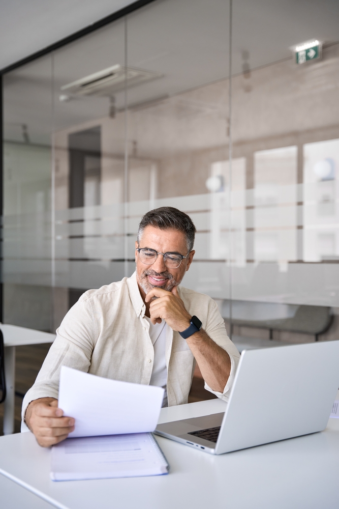 Investor reviewing a real estate wholesaling contract