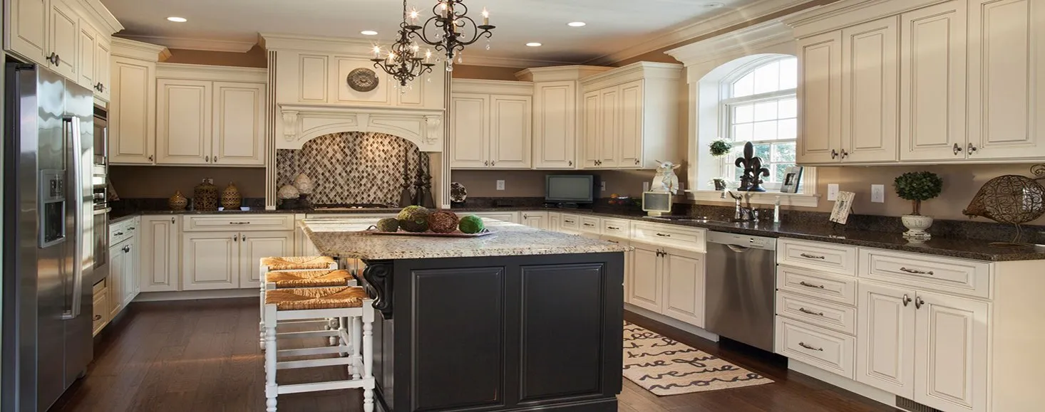 a kitchen with an island and stools