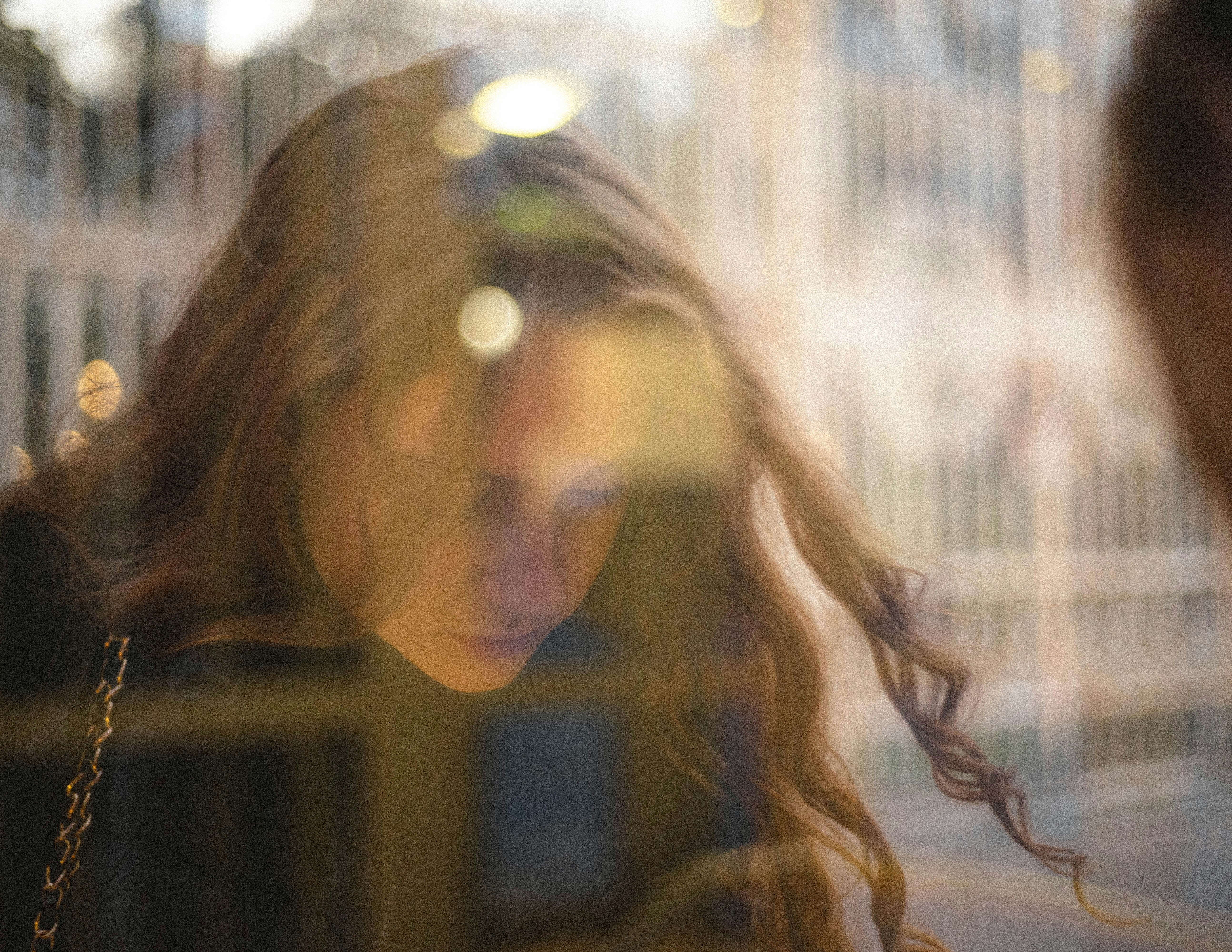 Reflective moment with smartphone—Connect My Mind there when you need a calm voice.