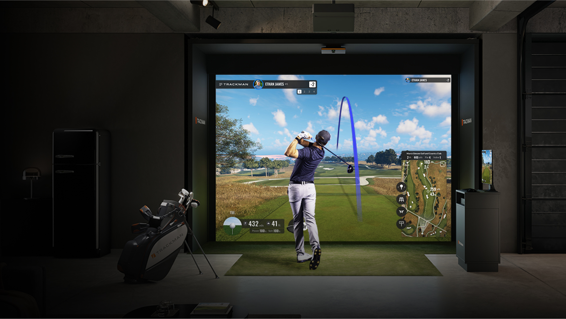 A golfer playing a Trackman golf simulator A golfer playing a Trackman golf simulator