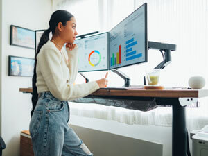 woman working standing desk