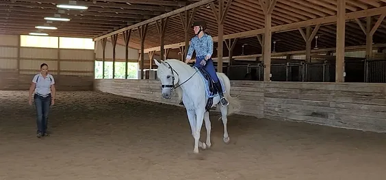 Amy Vanner teaching this rider how to influence her horse by using her body