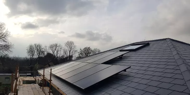 Clouds high up covering a solar panel from receiving sunlight Clouds high up covering a solar panel from receiving sunlight