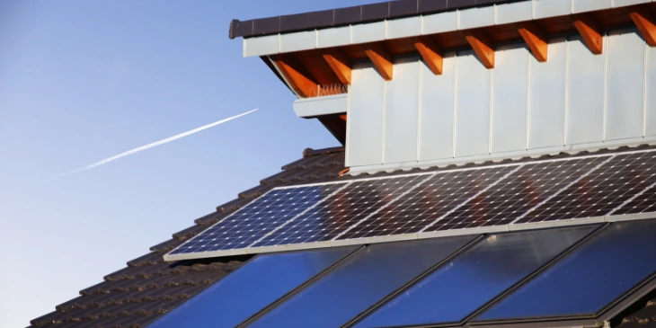 A roof with 10 solar panels fitted on it