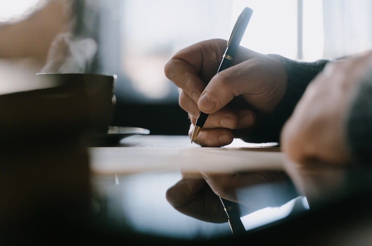 guy-handwriting-letter