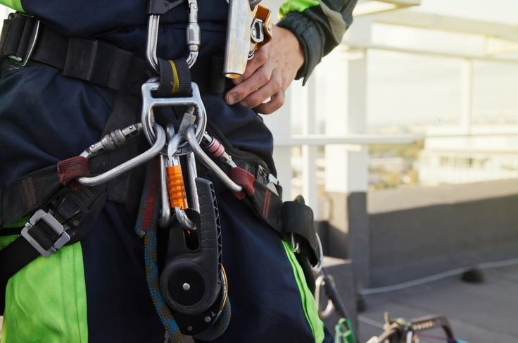 a person wearing a safety harness