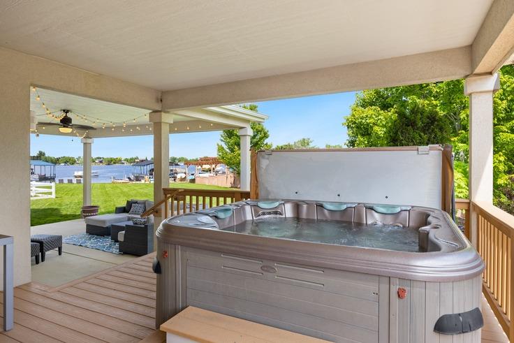 a hot tub outside on a deck