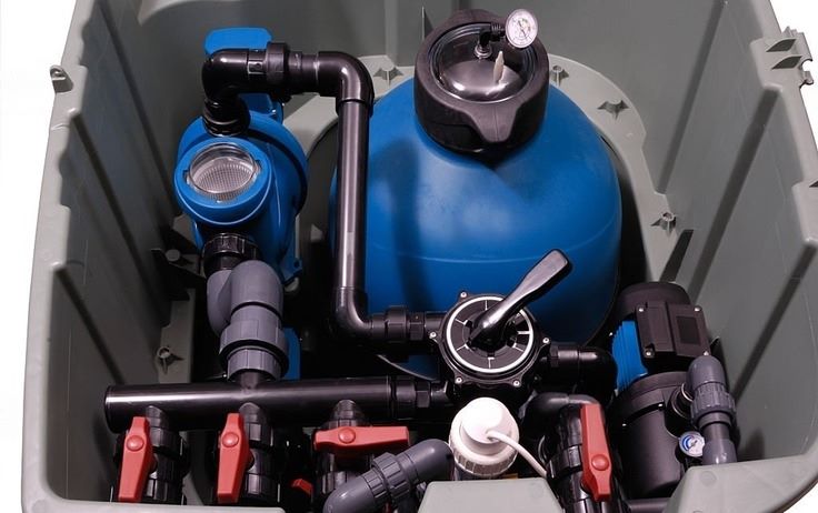 a close-up of a blue swimming pool pump 