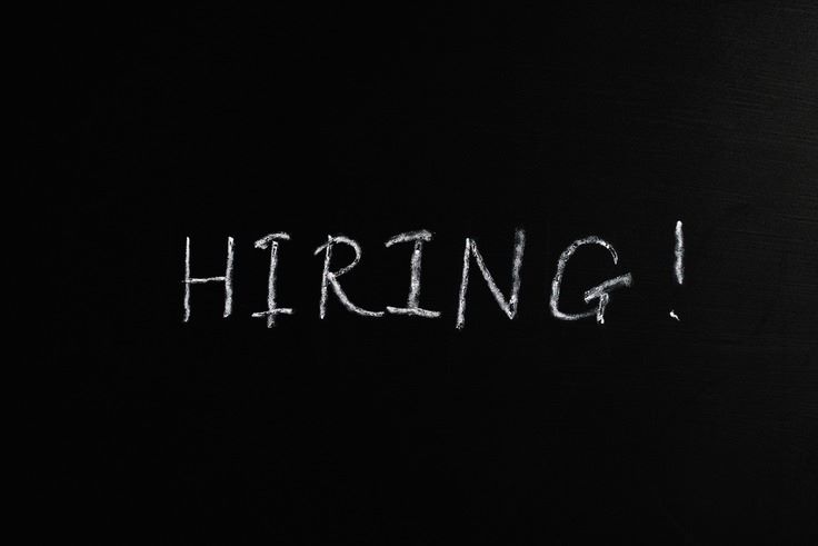 hiring written on a chalkboard