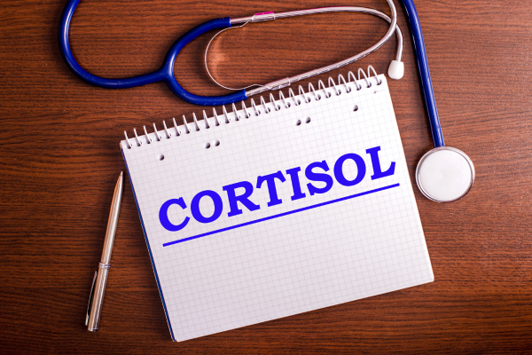 cortisol hand written next to a stethoscope