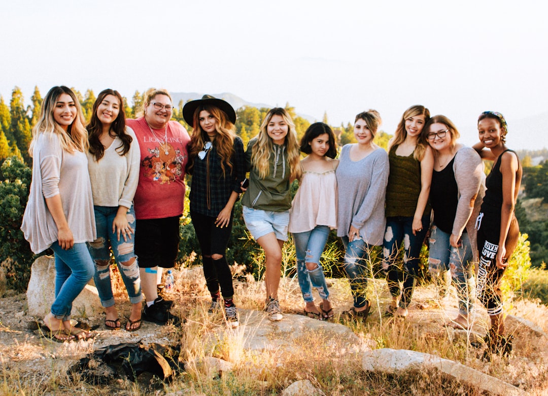 women standing women standing