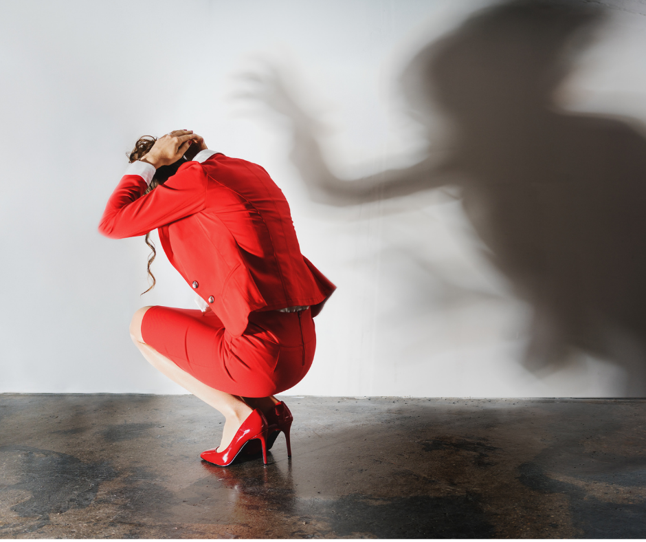 overwhelmed woman in red suit fighting burnout 