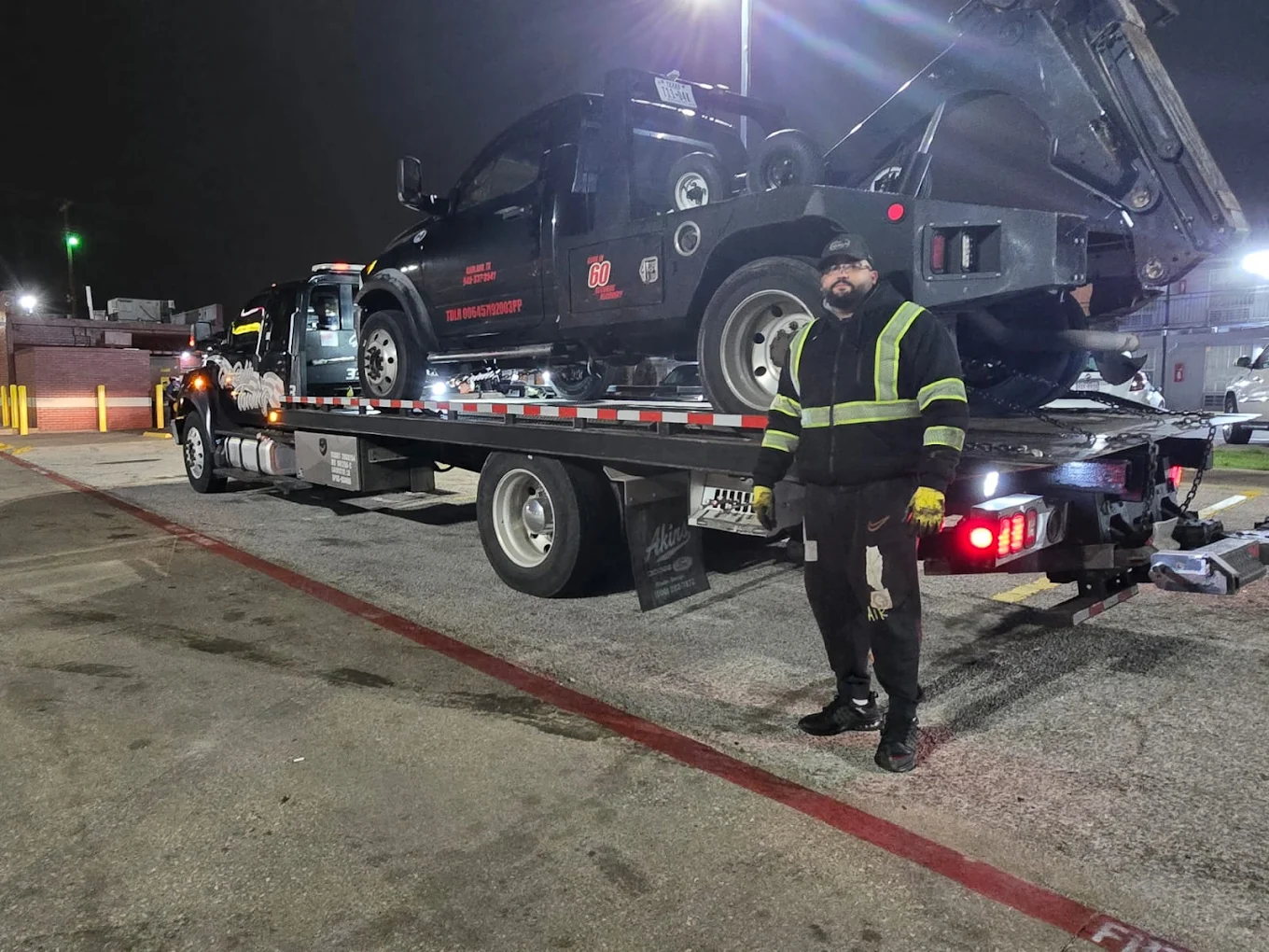 A professional tow truck from Masters Towing ready for service in Fort Worth, Texas