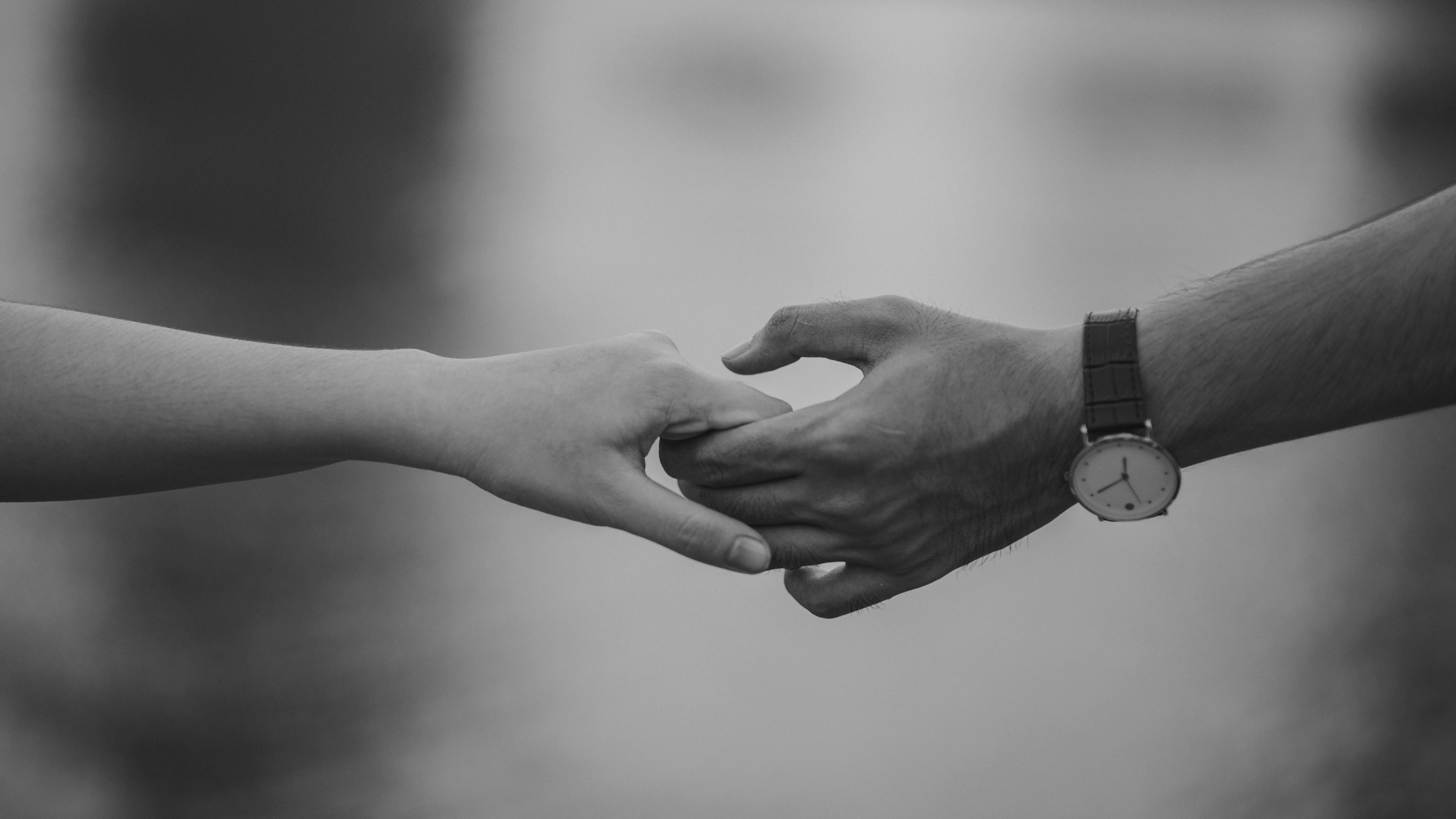 Couple embracing while reflecting on personal growth and transformation in their relationship