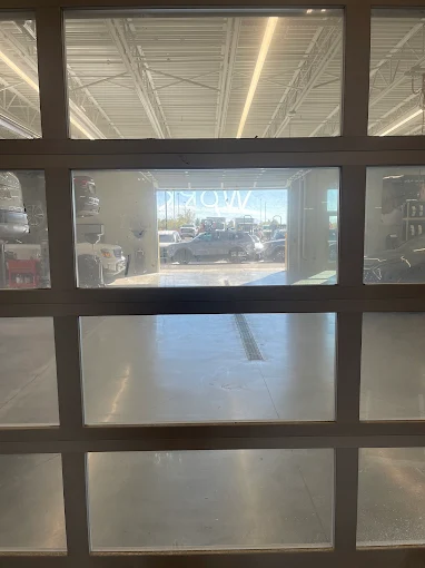 Before commercial window cleaning in Orem Utah showing dirt buildup on glass2