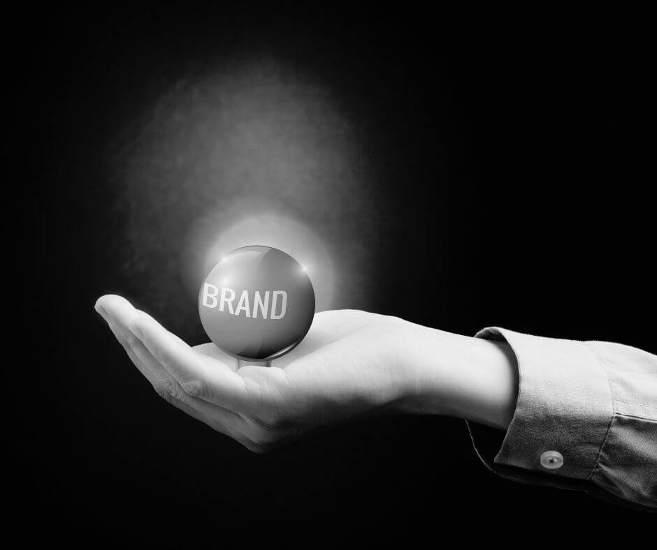 Hands holding a brand orb