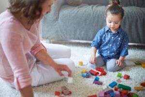 small child playing with toys