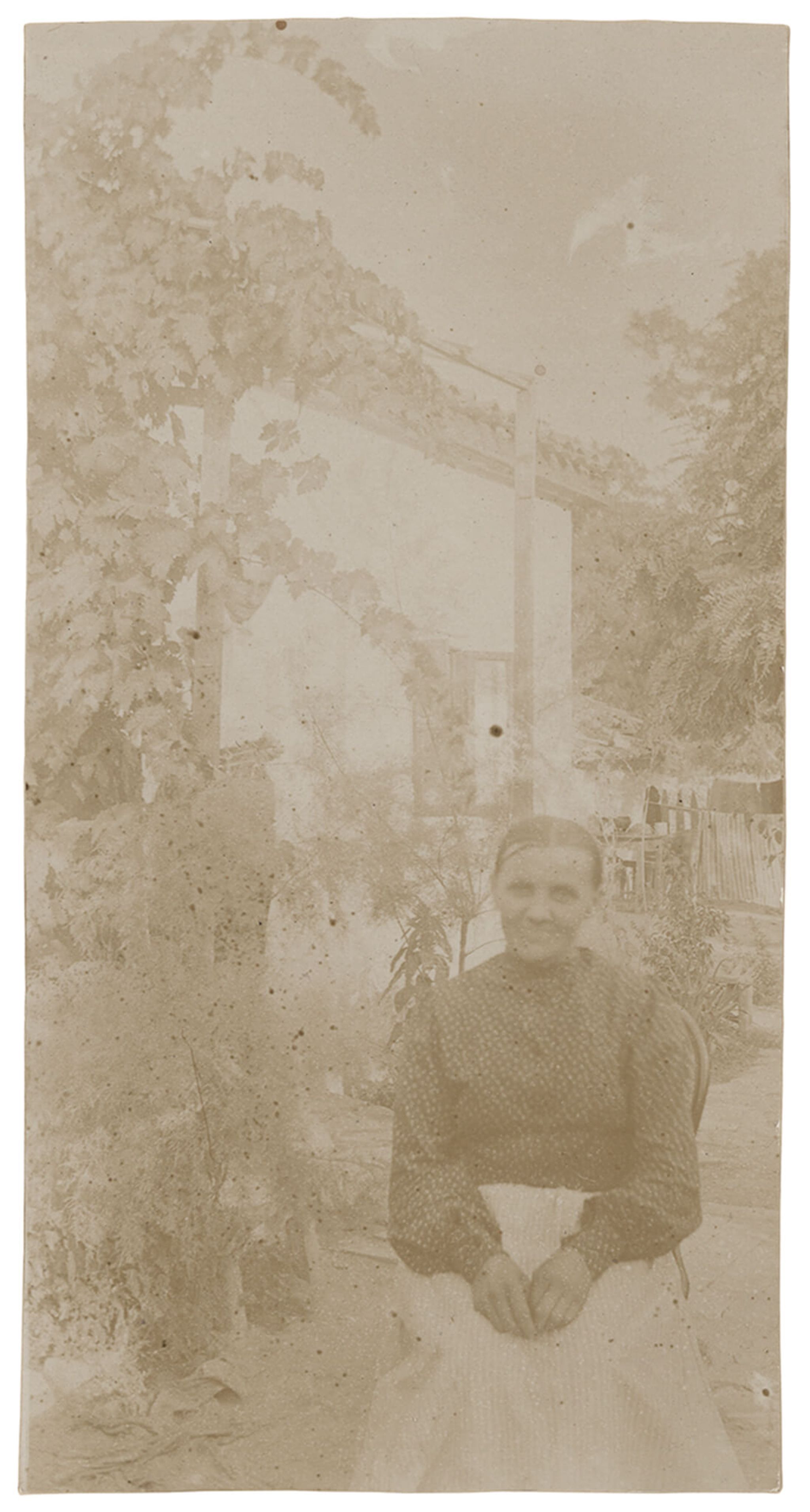 Image for: Woman Next to the House