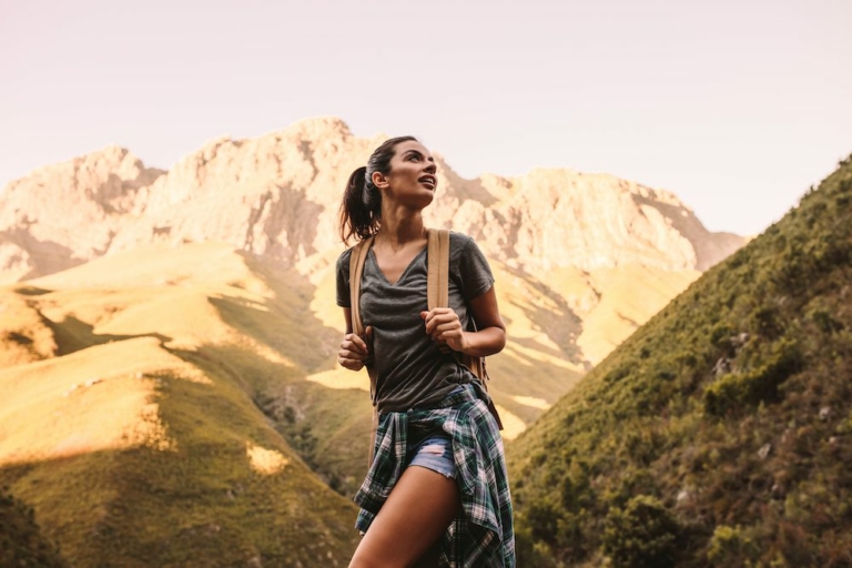 Woman on a solo trip to the mountains