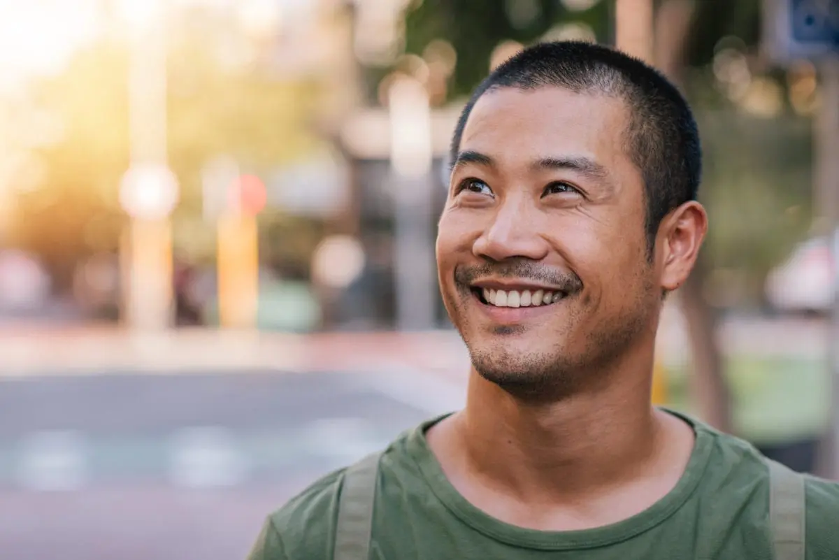 a smiling Asian guy