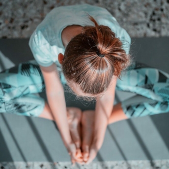 Aerial view of woman meditating