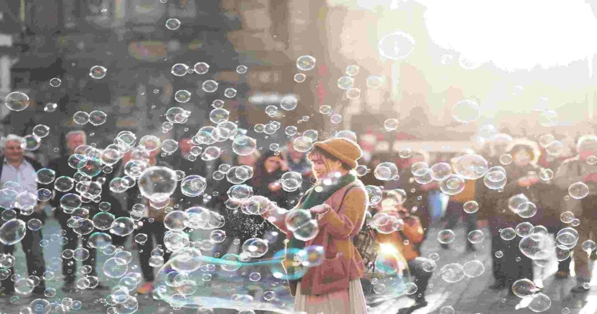 Woman surrounded by bubbles